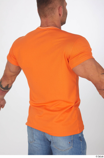 Garrott casual dressed orange t shirt upper body 0006.jpg